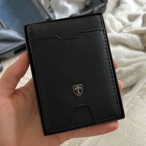 Brand new never used, still in box travando slim wallet